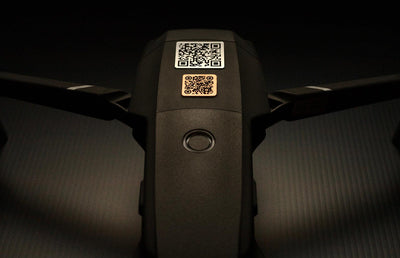 Drone tags made from metal or vinyl. Laser engraved QR codes.